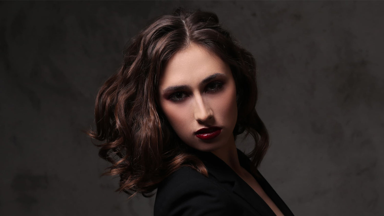 model with permed hair walking by