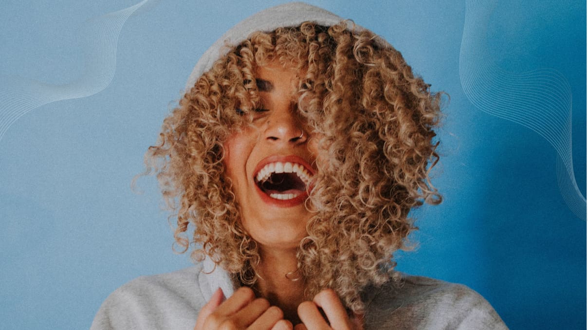 Happy girl with curly hair