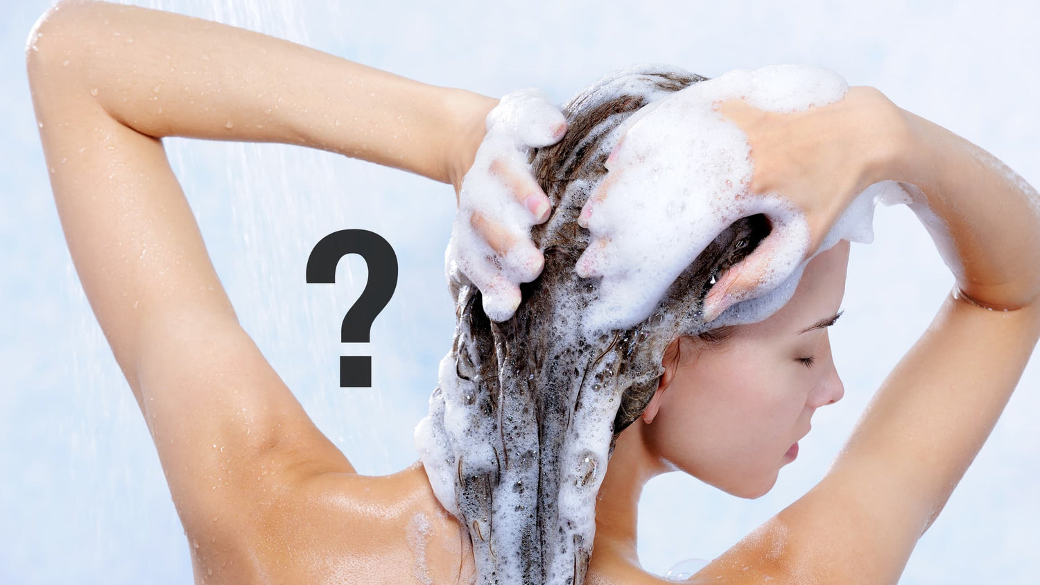 woman washing her hair frequently