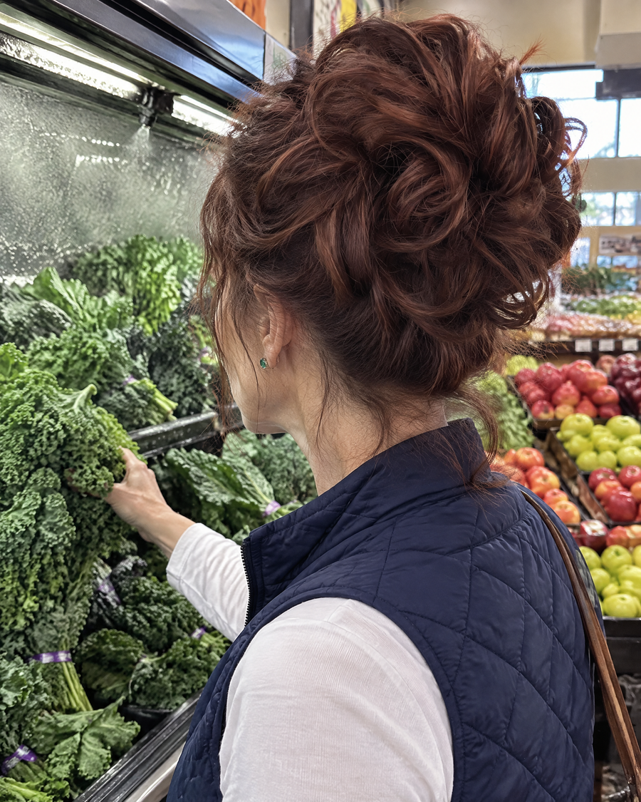 Woman wearing the JuvaBun Messy Bun in Auburn in the grocery store
