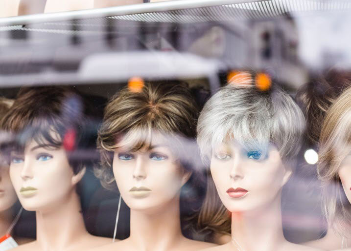 human hair wigs on the store display