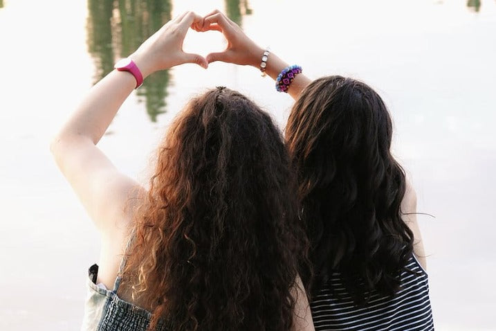 best friends with curly hair