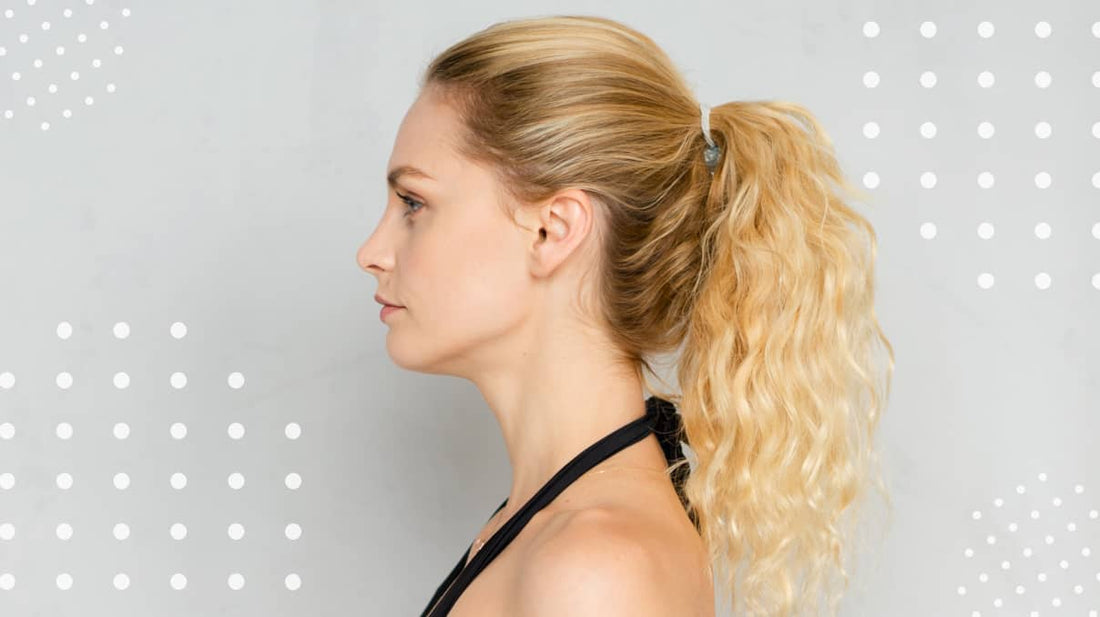 High ponytail with curled strands