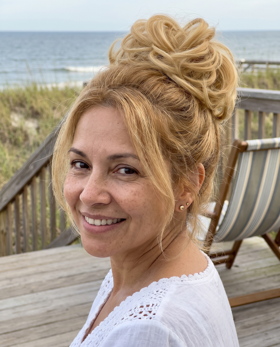 JuvaBun Messy Bun in Gold on a woman with golden blonde hair, front view