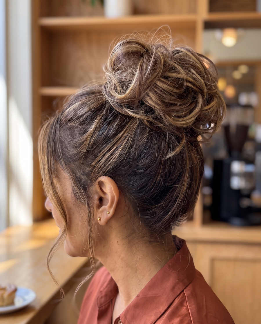 JuvaBun Messy Bun in Mix Walnut on a woman with highlighted walnut brown hair, close-up of the bun
